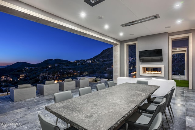 patio terrace at dusk with exterior bar