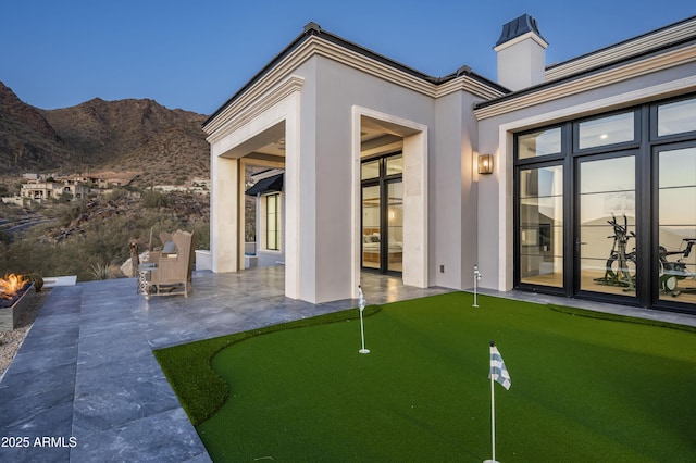 view of patio with a mountain view