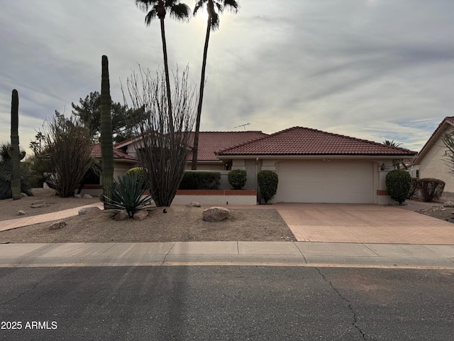 view of front of home with a garage