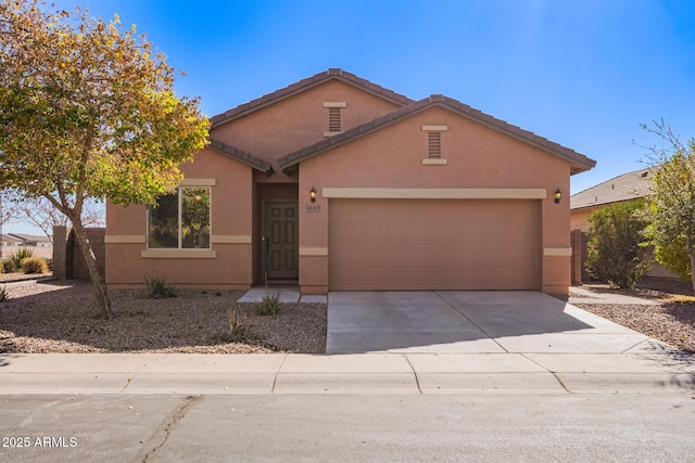 view of front of home featuring a garage