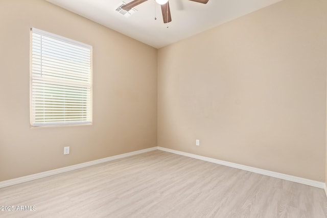 unfurnished room featuring ceiling fan and light wood-type flooring