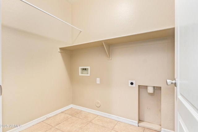 washroom featuring gas dryer hookup, washer hookup, electric dryer hookup, and light tile patterned floors