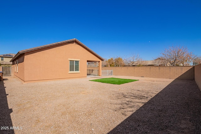 back of property with a patio area