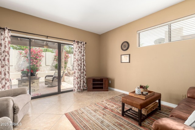 tiled living area with baseboards