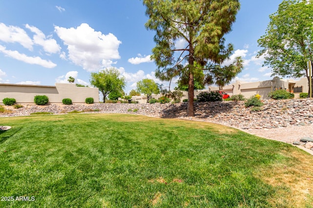 view of yard featuring fence