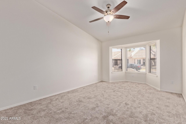 1021 S Greenfield Rd Unit 1211, Mesa, AZ 85206 - unfurnished room with lofted ceiling, carpet flooring, and ceiling fan