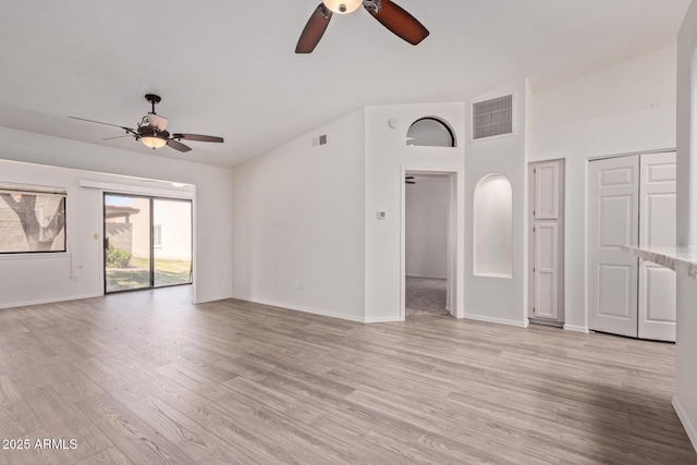 1021 S Greenfield Rd Unit 1211, Mesa, AZ 85206 - unfurnished living room featuring a ceiling fan and light wood-style flooring