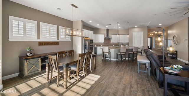 dining area with recessed lighting, a ceiling fan, visible vents, baseboards, and dark wood finished floors