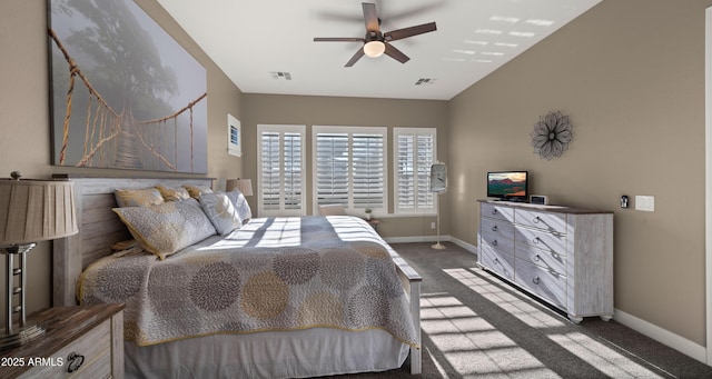 carpeted bedroom with a ceiling fan, visible vents, and baseboards