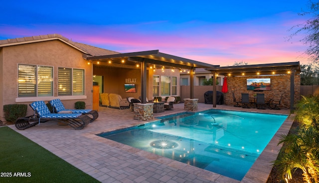 view of swimming pool featuring a fire pit, a patio, area for grilling, and fence