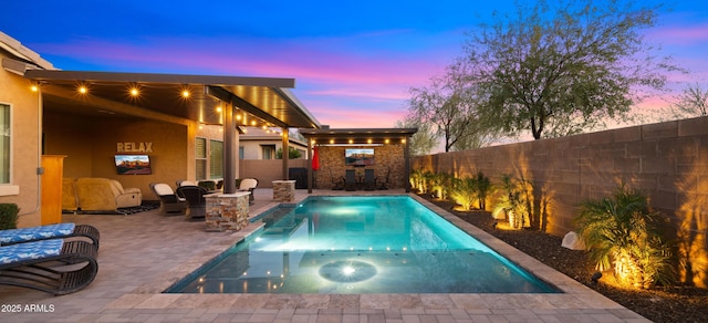 view of pool with a patio area, a fenced backyard, and a fenced in pool