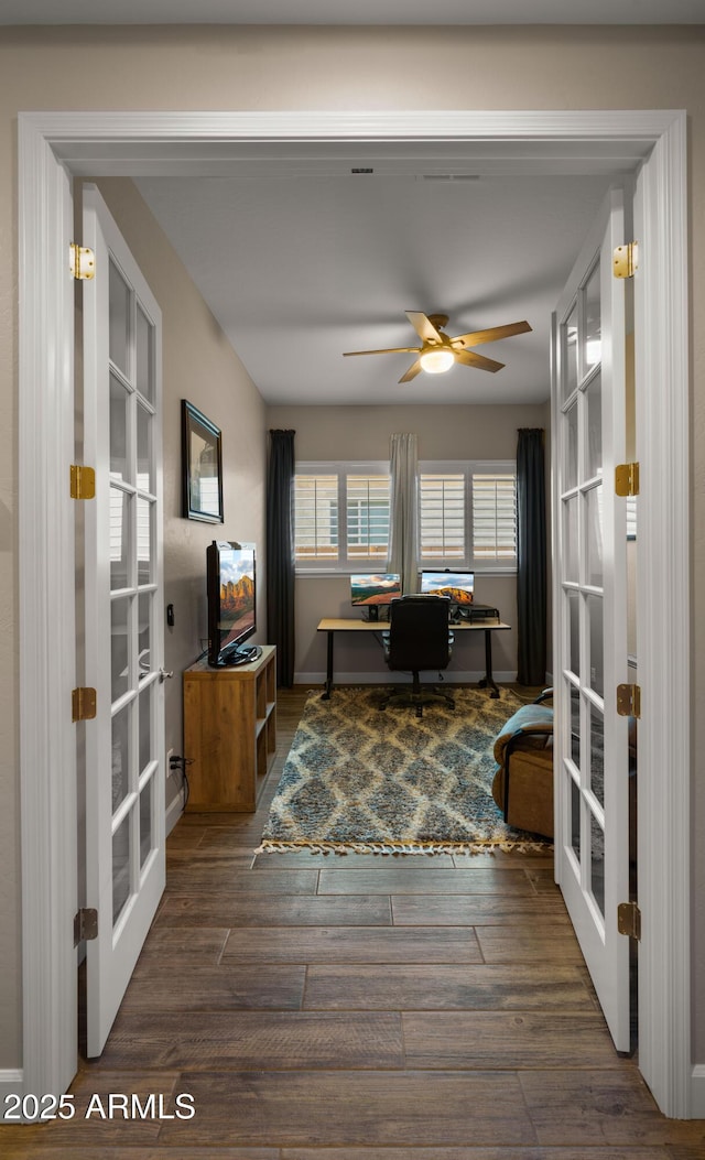 office space with ceiling fan, wood finished floors, and french doors