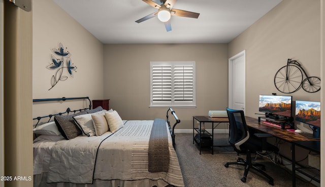 bedroom with ceiling fan, baseboards, and carpet flooring