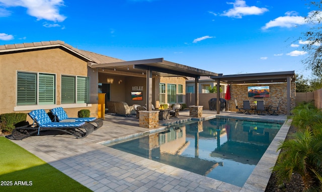 view of swimming pool with fence, a fenced in pool, and a patio