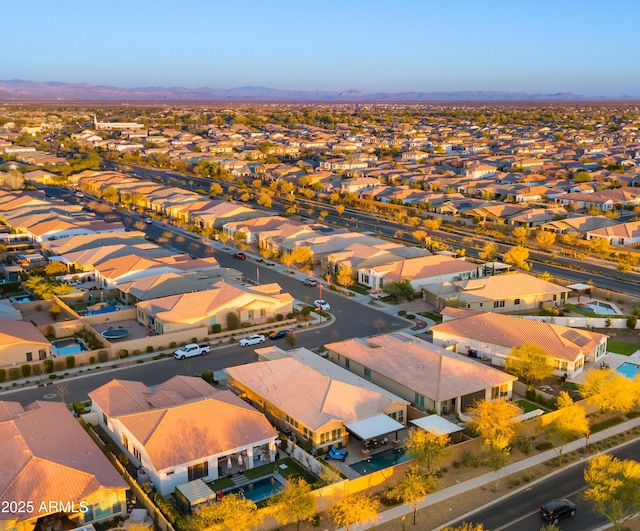 birds eye view of property featuring a residential view and a mountain view