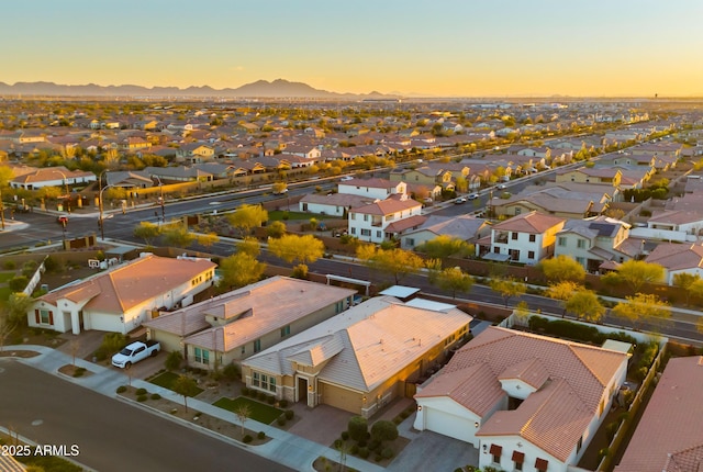 aerial view at dusk with a residential view