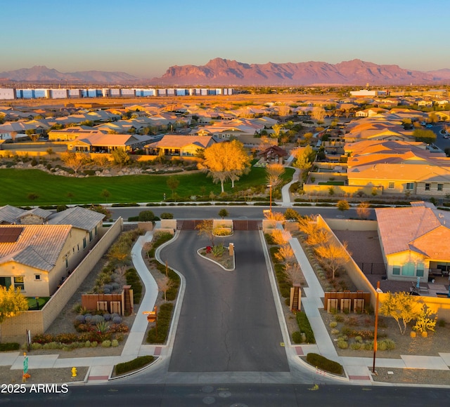 drone / aerial view with a residential view and a mountain view