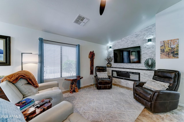 2101 S Meridian Rd Unit 250, Apache Junction, AZ 85120 - living room featuring lofted ceiling, a fireplace, baseboards, and ceiling fan
