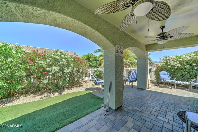 2101 S Meridian Rd Unit 250, Apache Junction, AZ 85120 - view of patio with a ceiling fan and a fenced backyard