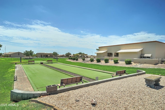 2101 S Meridian Rd Unit 250, Apache Junction, AZ 85120 - view of community with a bocce ball area and a yard