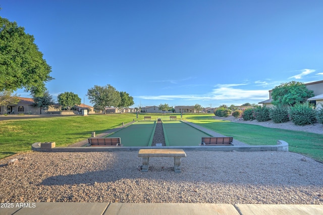 2101 S Meridian Rd Unit 250, Apache Junction, AZ 85120 - view of home's community with a bocce ball area, a lawn, and a residential view
