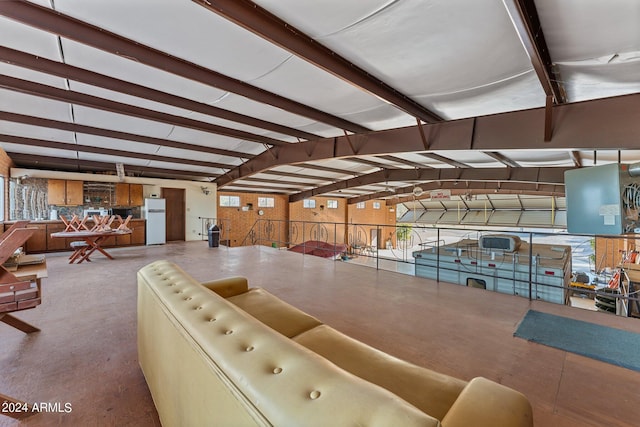 miscellaneous room featuring beam ceiling