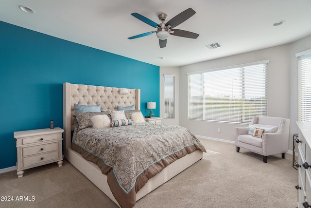 carpeted bedroom with ceiling fan