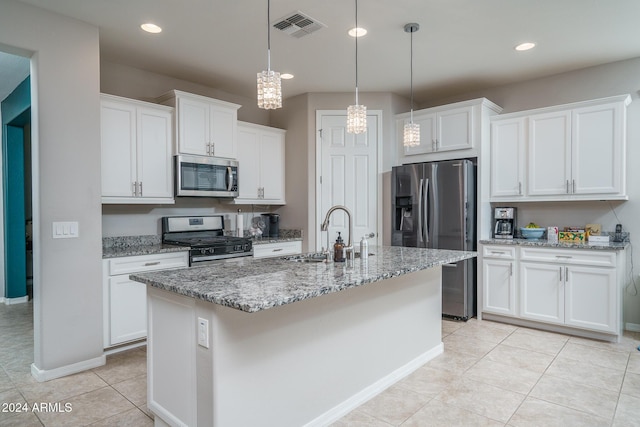 kitchen with white cabinetry, sink, a center island with sink, and appliances with stainless steel finishes