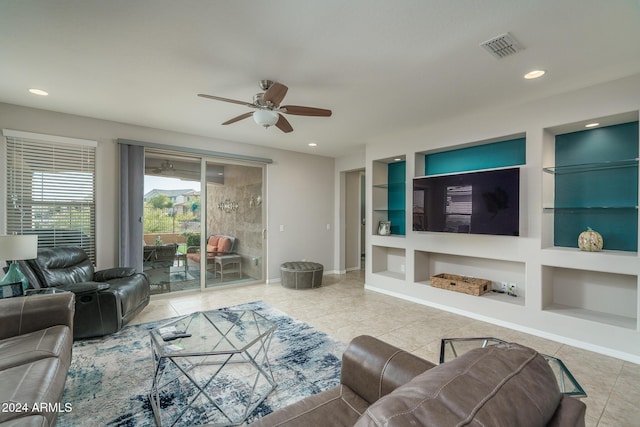 tiled living room with built in shelves and ceiling fan