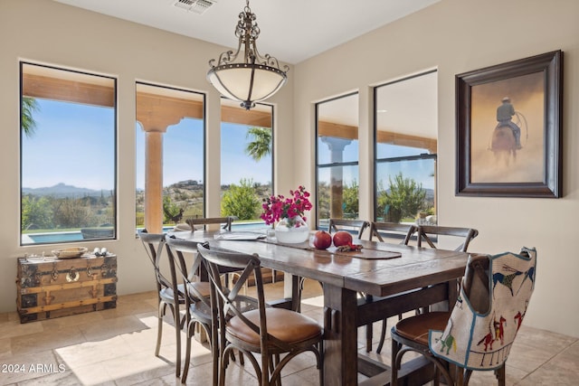 dining area with a mountain view