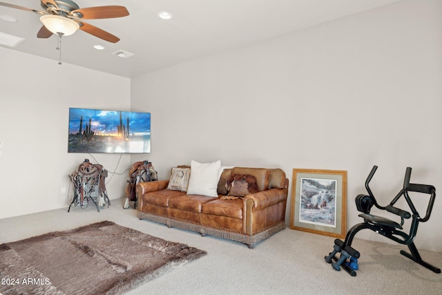 living room with carpet flooring and ceiling fan