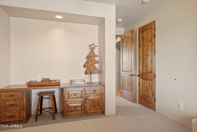 hallway with light carpet