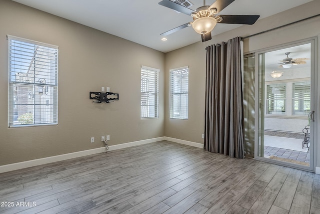 22255 E Quintero Rd, Queen Creek, AZ 85142 - unfurnished room featuring healthy amount of natural light, ceiling fan, and recessed lighting