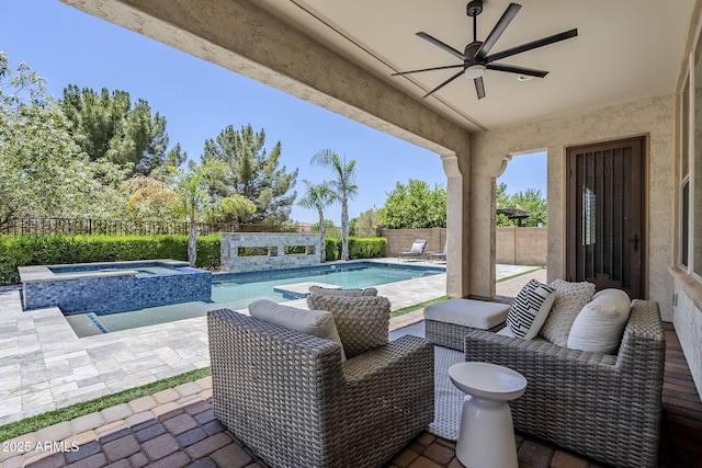 22255 E Quintero Rd, Queen Creek, AZ 85142 - fenced backyard with ceiling fan, an in-ground hot tub, and a patio area