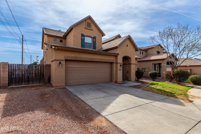 view of front of home with driveway, a tile roof, an attached garage, fence, and stucco siding