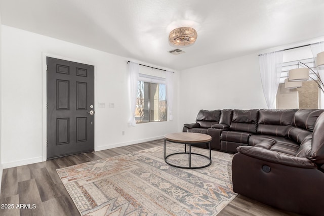 living room with dark wood-type flooring