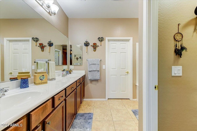 bathroom featuring tile patterned floors and vanity