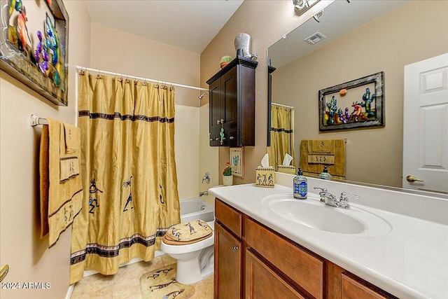 full bathroom featuring tile patterned flooring, vanity, toilet, and shower / bathtub combination with curtain