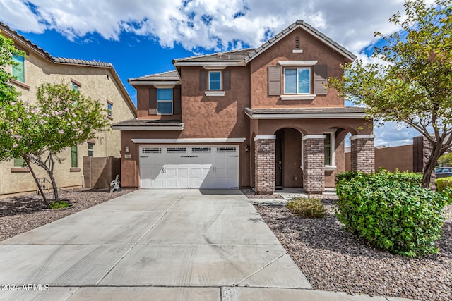 view of front of property featuring a garage