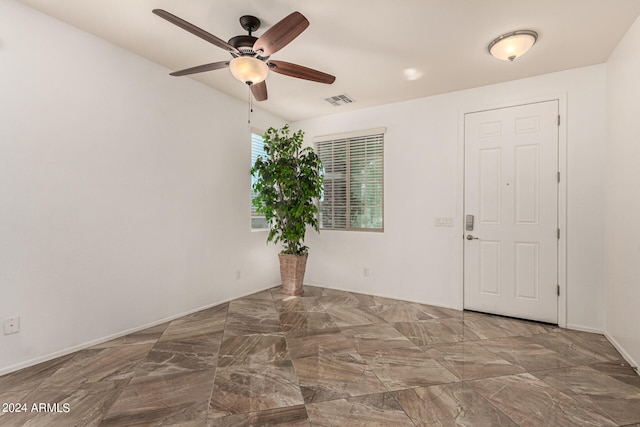 empty room with ceiling fan