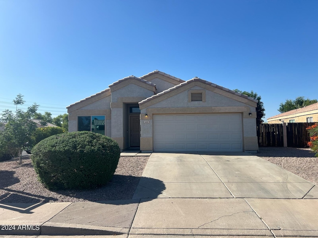 view of front of property featuring a garage