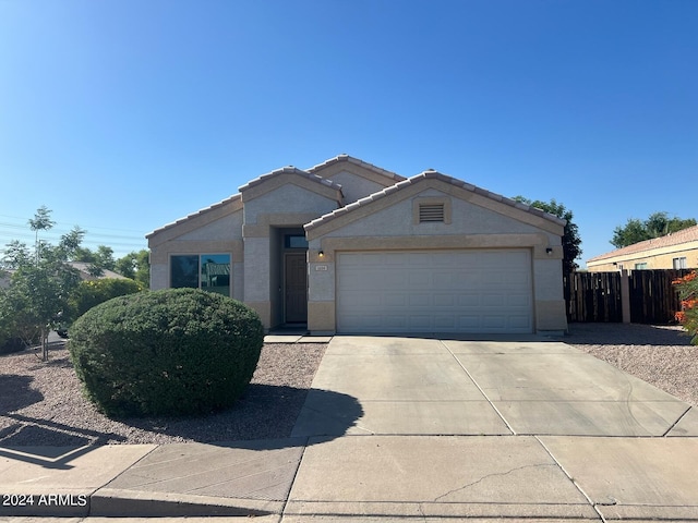 view of front of property featuring a garage