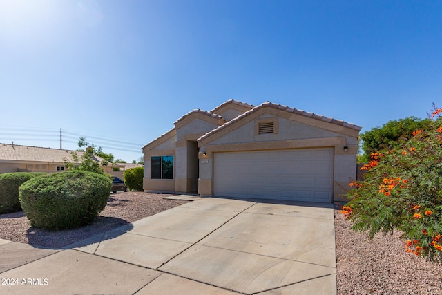 view of front of home with a garage