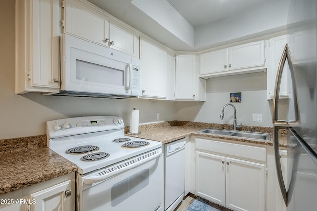 17 E Ruth Ave Unit 303, Phoenix, AZ 85020 - kitchen with white appliances, a sink, and white cabinets