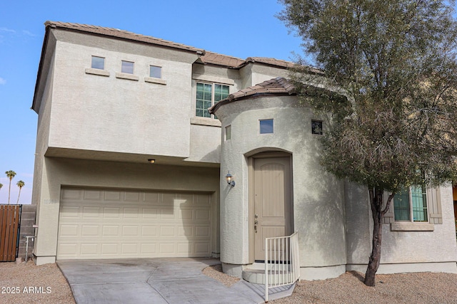 view of front of property with a garage