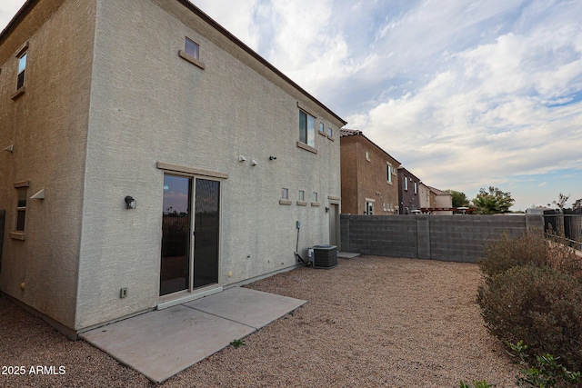 rear view of house featuring a patio