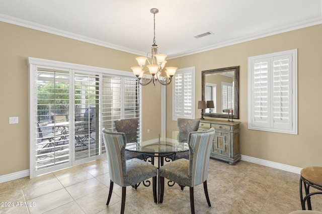 tiled dining area with crown molding and a notable chandelier