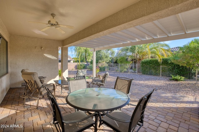 view of patio featuring a pergola and ceiling fan