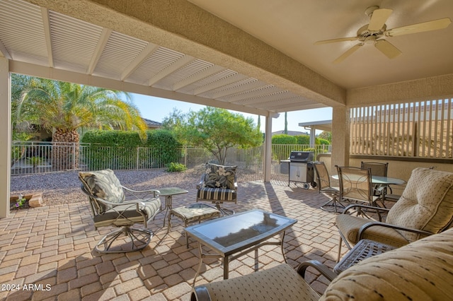 view of patio / terrace featuring area for grilling and ceiling fan