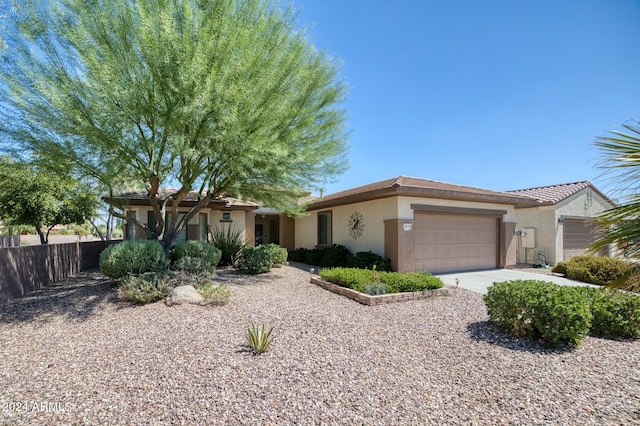 single story home featuring a garage